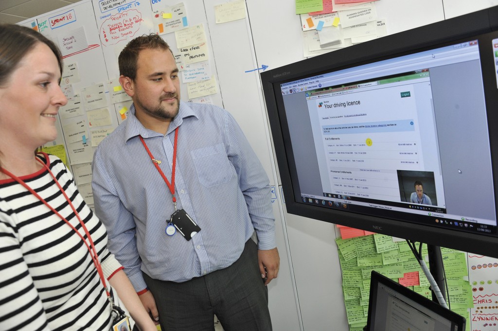 Staff looking at the new service on a screen
