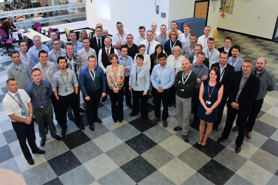 The View Driving Licence team standing in DVLA atrium