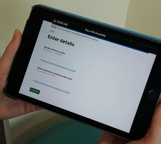 Tablet showing screen on new pay a DVLA fine service